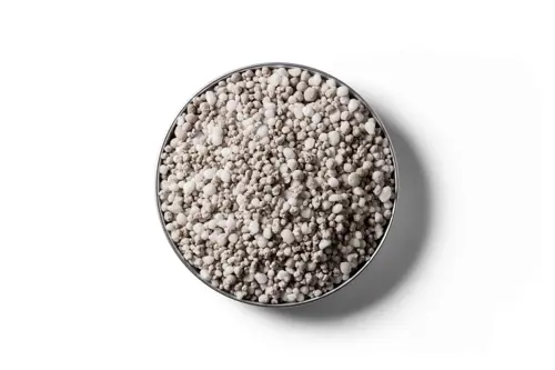 Nitrogen Super fertiliser granules in a round dish
