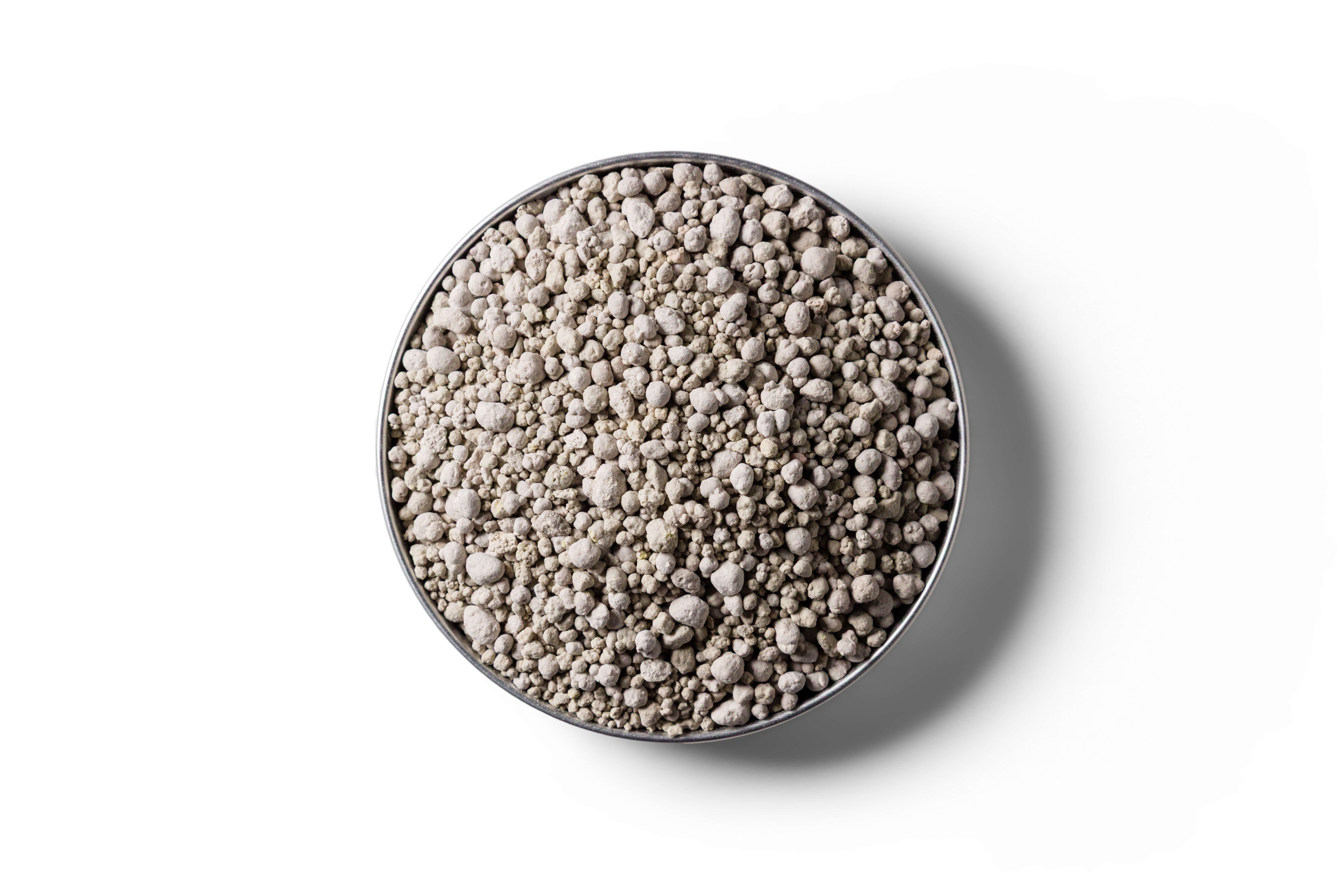 Sulphur Super 20 fertiliser granules in a round dish