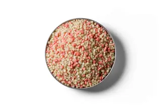 Cropmaster 13 fertiliser granules in a round dish