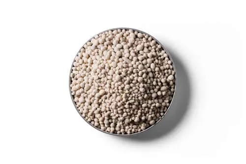 Kieserite fertiliser granules in a round dish