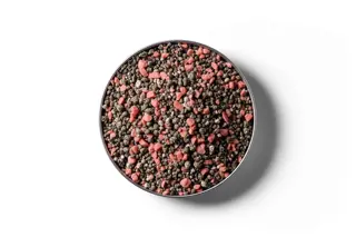 20% Potash Serpentine Super fertiliser granules in a round dish
