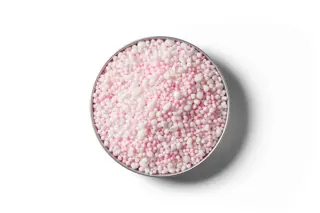 Ammo 36 Pro fertiliser granules in a round dish